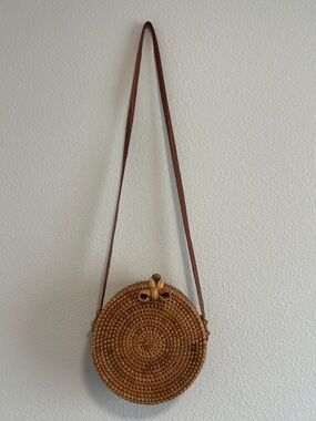 Round Woven Straw Crossbody Bag with Brown Strap